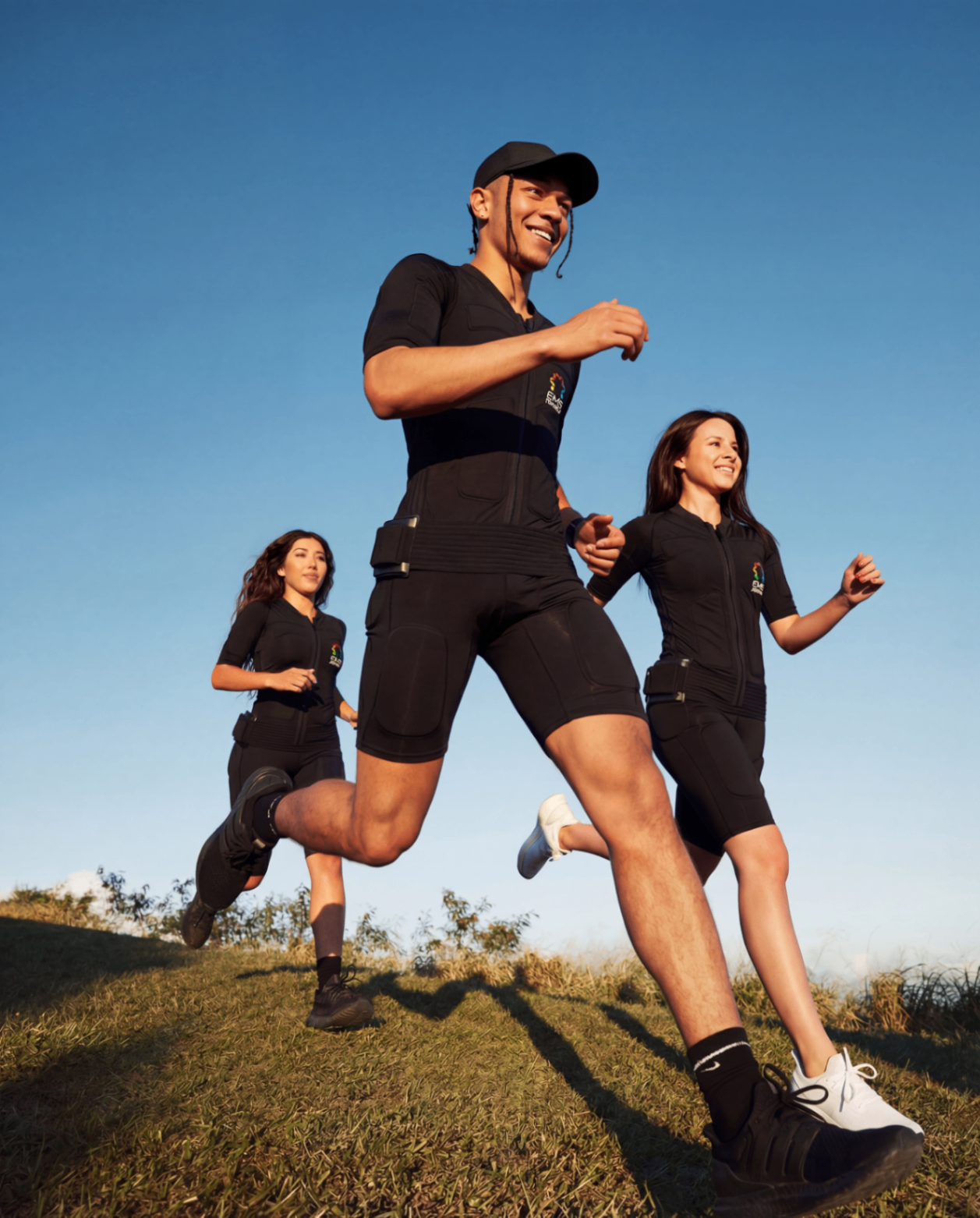 Healthy, confident OHM Fitness members enjoying an active lifestyle